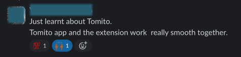 Slack message stating the Tomito app and extension work smoothly together